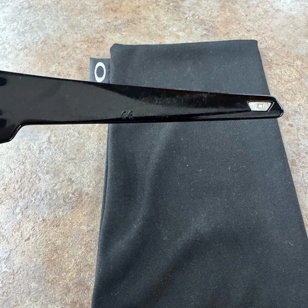 Oakley Wrap Sunglasses with Black Frame and Red-Orange Mirrored Lenses - Picture 6 of 11